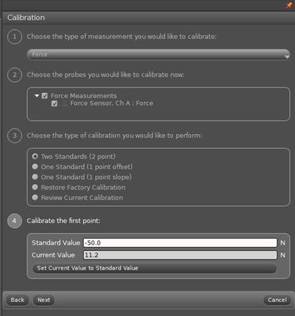 The calibrate sensors window in Capstone has a group of settings at the top titled Sensor, Measurement, Unit.  The first box in this group is set to Force Sensor, the next box is set to Force (N), and the option Calibrate all similar measurements simultaneously is not selected.  Beneath these settings are boxes that display the Slope and Offset of the Previous Calibration and the Present Sensor Measurement.  Beneath these boxes is an option titled Calibration Type with radio button 2 Point (Adjust Slope and Offset) selected.  Next there are input boxes for the Standard Value and Sensor Value for Calibration Point 1 and Calibration Point 2 with both calibration point groups having a Read From Sensor button.  These are followed by a group of boxes that display the Slope and Offset of the New Calibration.